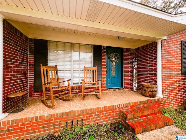 entrance to property with a porch