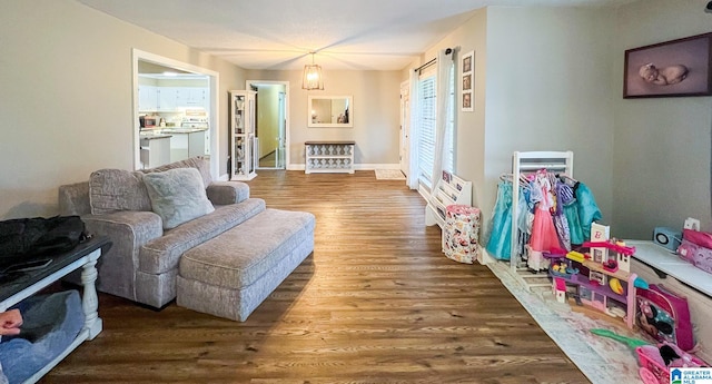 interior space featuring a notable chandelier and hardwood / wood-style floors