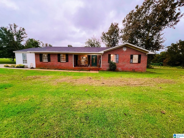 ranch-style house with a front lawn