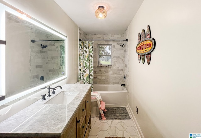 bathroom featuring shower / bath combo with shower curtain, tile patterned floors, and vanity