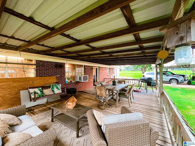 wooden deck with an outdoor living space