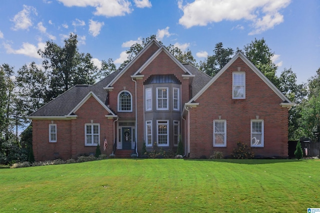 view of property featuring a front yard