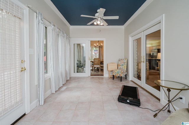 interior space with ornamental molding, a notable chandelier, and light tile patterned flooring