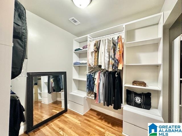 walk in closet featuring light wood-type flooring