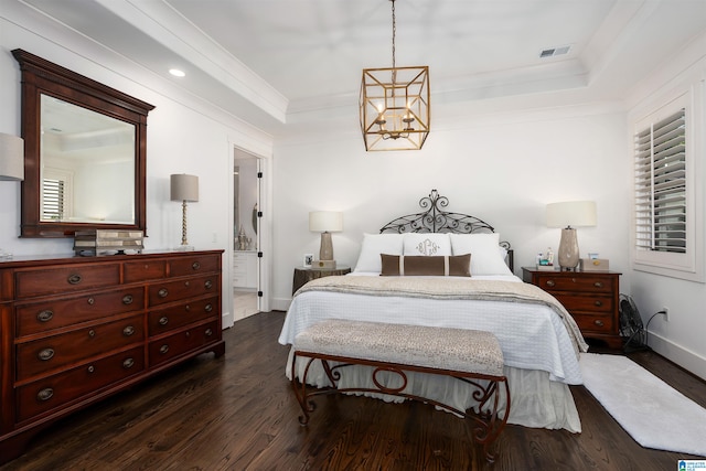 bedroom with an inviting chandelier, crown molding, dark hardwood / wood-style flooring, and a raised ceiling