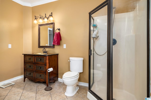 bathroom featuring vanity, crown molding, tile patterned flooring, toilet, and an enclosed shower