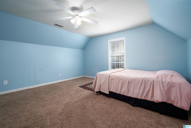 bedroom featuring ceiling fan, lofted ceiling, and carpet flooring