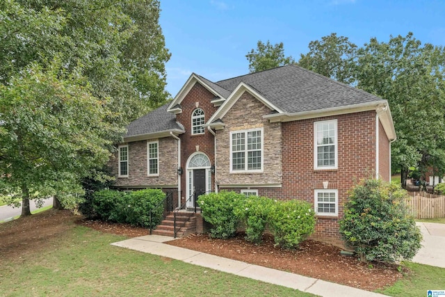 split foyer home with a front yard