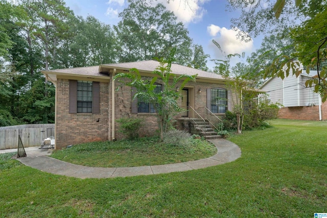 view of front of house with a front lawn