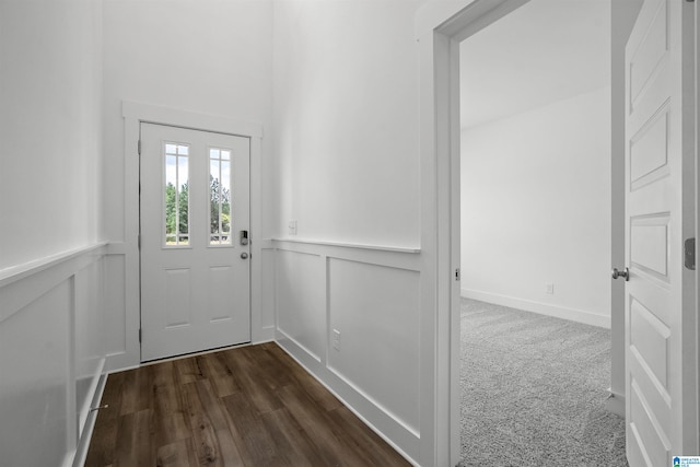 doorway to outside featuring dark hardwood / wood-style flooring