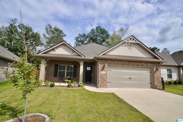 craftsman-style house featuring a front yard and a garage