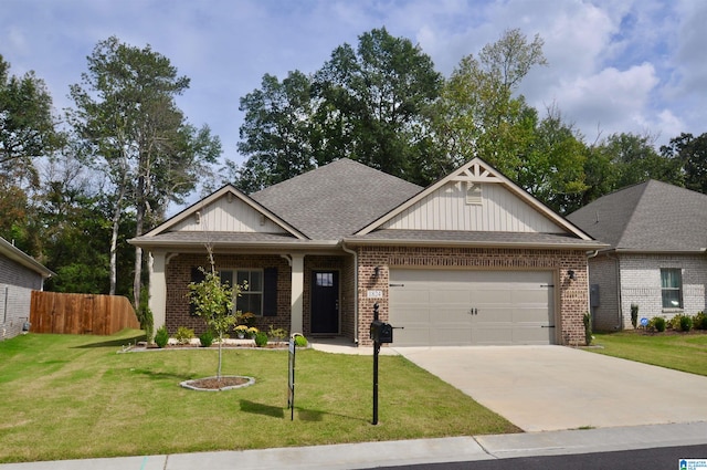 craftsman-style house with a front yard and a garage