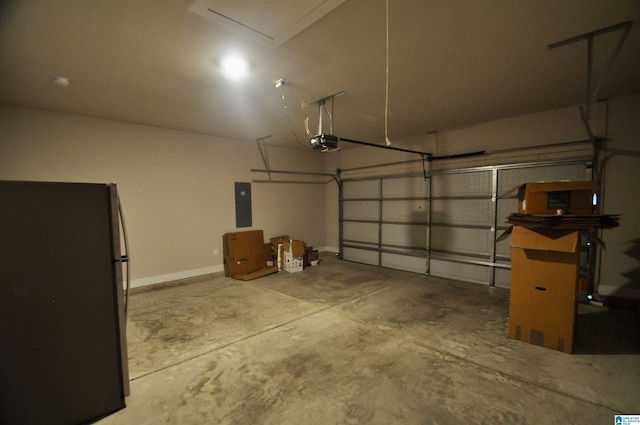 garage featuring a garage door opener, electric panel, and refrigerator