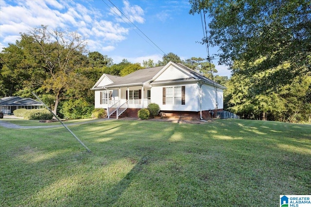 view of front of property with a front yard and a porch