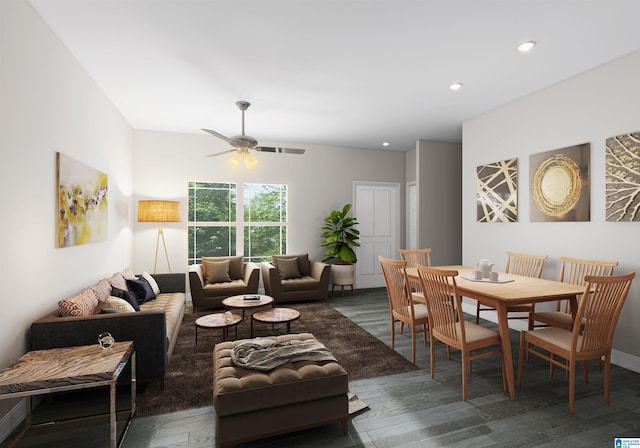 living room featuring ceiling fan and dark wood-type flooring