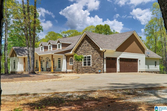 view of front facade with a garage and covered porch