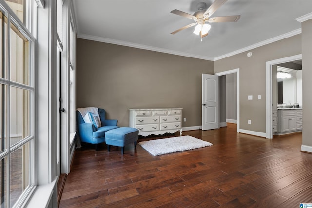 living area with ornamental molding, dark hardwood / wood-style floors, and ceiling fan