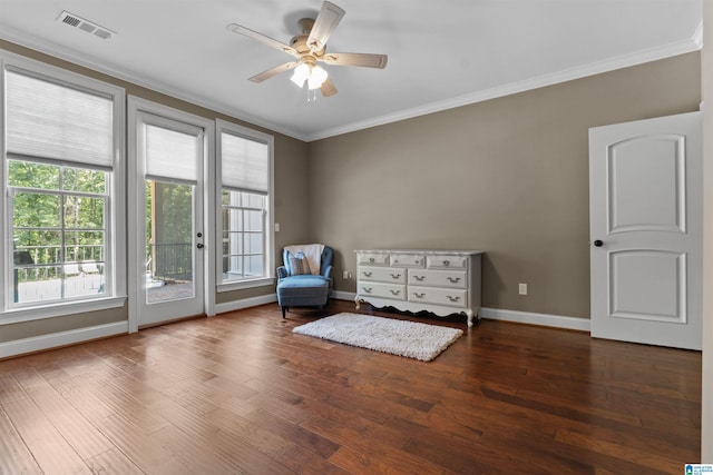 unfurnished room with ceiling fan, dark hardwood / wood-style floors, and ornamental molding