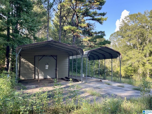 view of outdoor structure with a carport