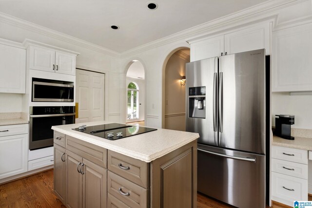 kitchen featuring white cabinets and stainless steel appliances