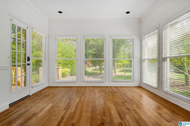 unfurnished sunroom with a healthy amount of sunlight