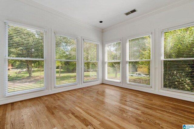 unfurnished sunroom with a healthy amount of sunlight