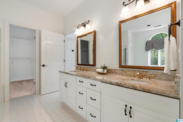 bathroom with vanity and tile patterned floors