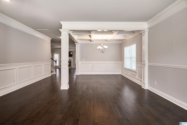 interior space featuring dark hardwood / wood-style flooring and ornate columns