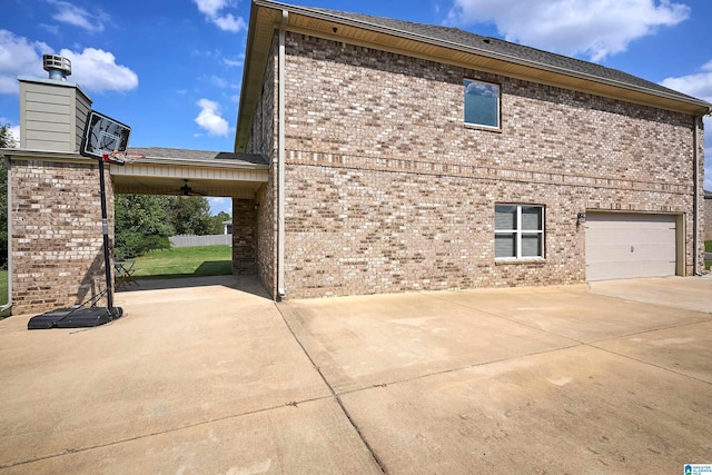 view of property exterior with a garage