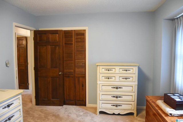 interior space with a textured ceiling