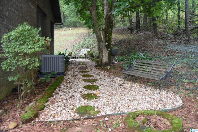 view of yard featuring central AC