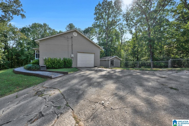 view of property exterior with a garage