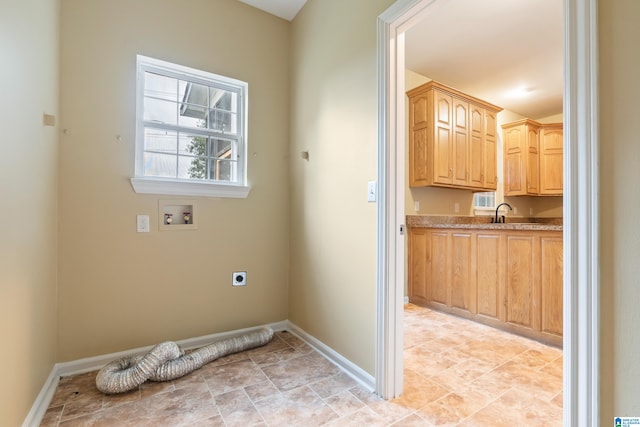 laundry room with washer hookup and electric dryer hookup