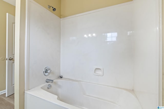 bathroom with  shower combination and hardwood / wood-style flooring