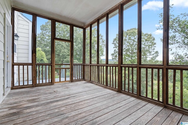 unfurnished sunroom featuring a wealth of natural light