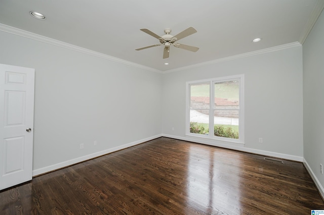 spare room featuring ceiling fan, dark hardwood / wood-style floors, and ornamental molding