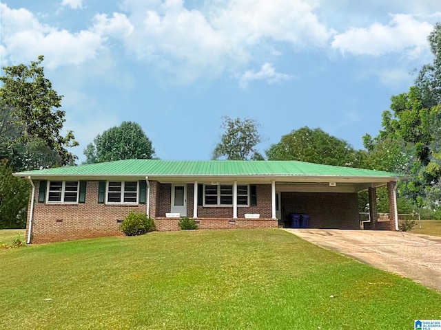 ranch-style house with a front yard and a carport