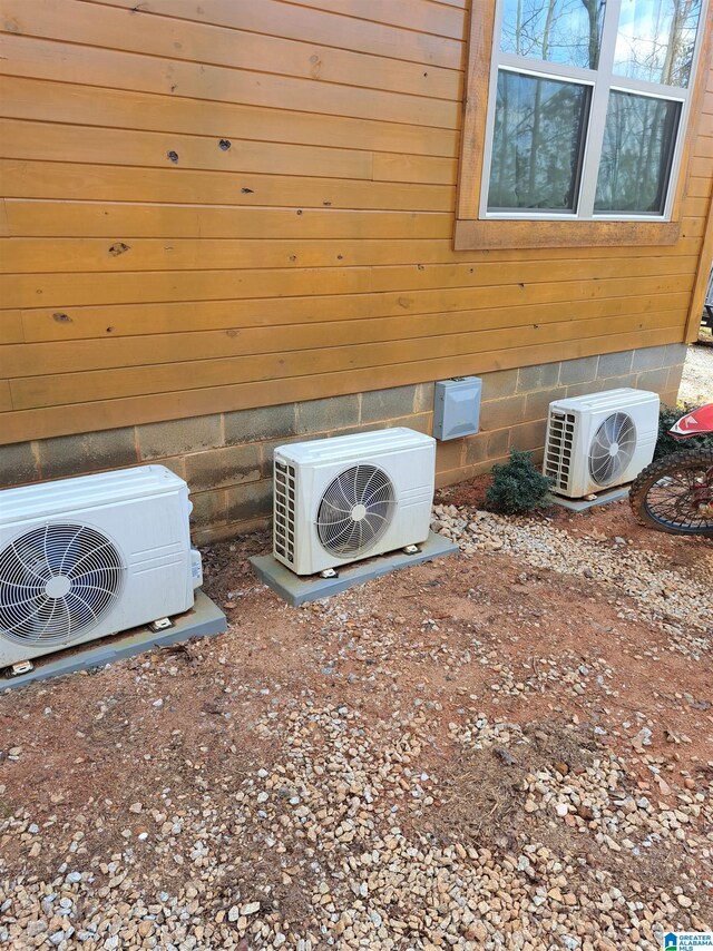 details with ac unit and wood walls