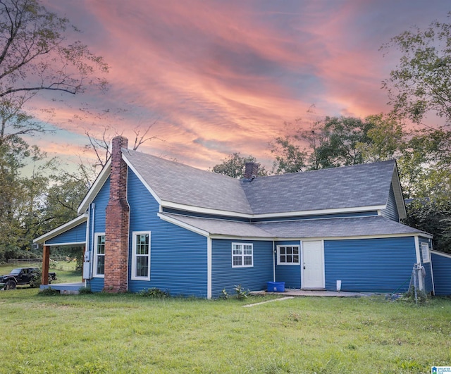 334 Ashland Ave, Wadley, AL 36276 - view of front of property with a garage and a yard