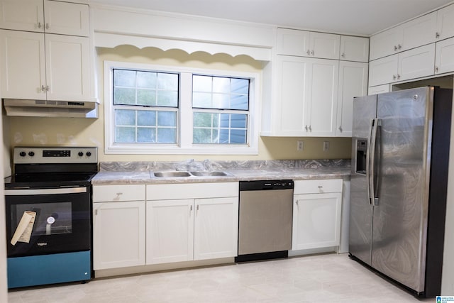 334 Ashland Ave, Wadley, AL 36276 - kitchen featuring appliances with stainless steel finishes, sink, and white cabinetry