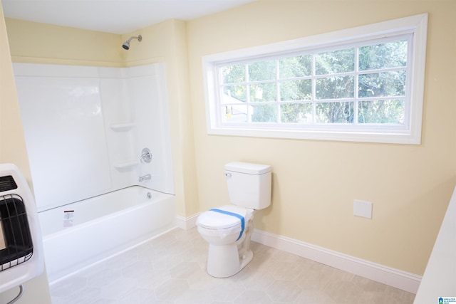 334 Ashland Ave, Wadley, AL 36276 - bathroom with heating unit,  shower combination, and toilet