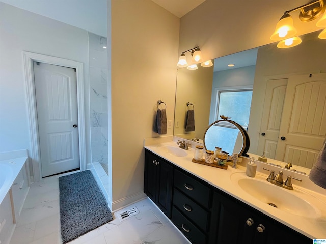 bathroom featuring separate shower and tub and vanity