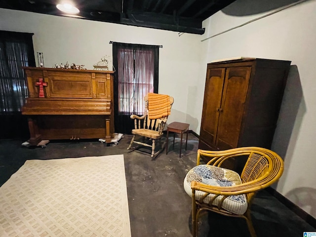 sitting room with concrete flooring