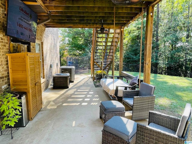 view of patio featuring outdoor lounge area and central air condition unit