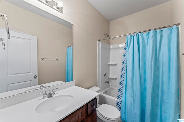 full bathroom featuring vanity, toilet, and shower / bath combo with shower curtain