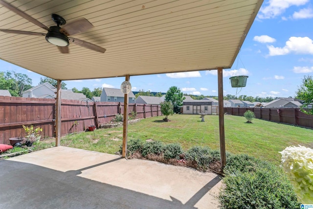 view of patio featuring ceiling fan