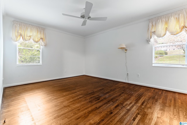 unfurnished room featuring ornamental molding, wood-type flooring, ceiling fan, and plenty of natural light