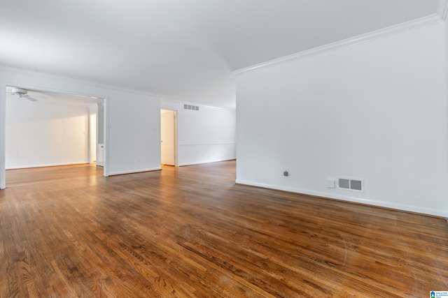 empty room with crown molding, hardwood / wood-style floors, and ceiling fan