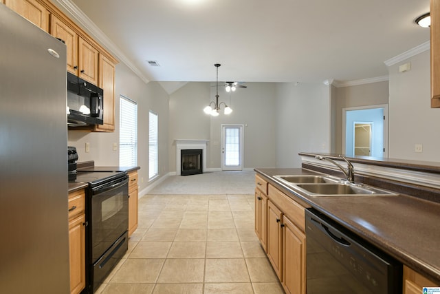 kitchen featuring pendant lighting, light tile patterned flooring, sink, black appliances, and ornamental molding