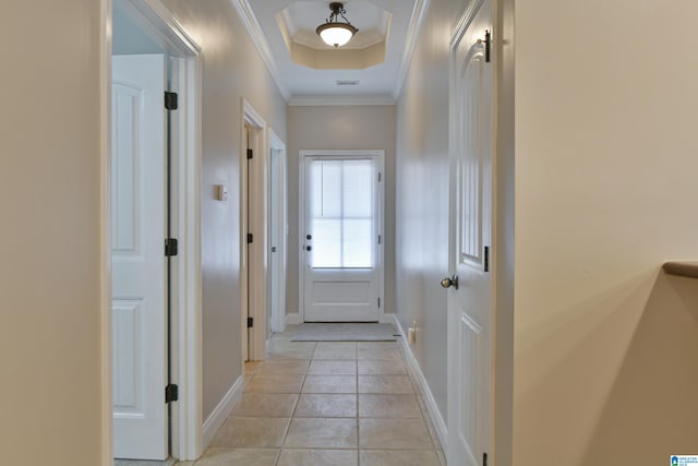 interior space featuring light tile patterned flooring and crown molding